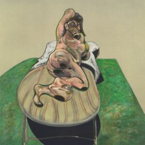 A distorted, abstract figure reclines on a bed with one arm raised. The figure is rendered in fleshy tones, and the bed is placed on a green surface with a rounded, striped table in the foreground.